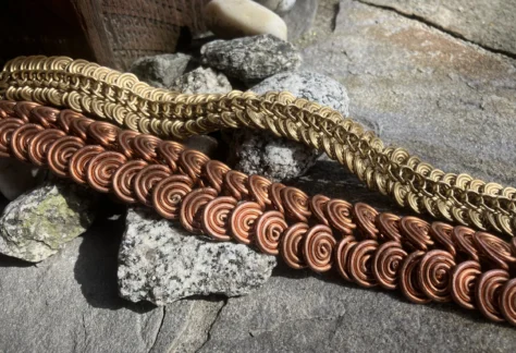 Copper and brass bracelets with spiral Egyptian links