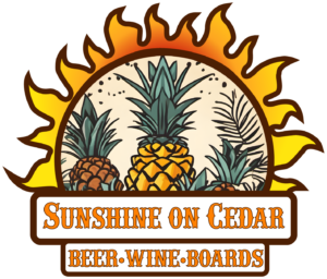 Sunshine on Cedar official logo Sunshine on Cedar logo with pineapples and a sun